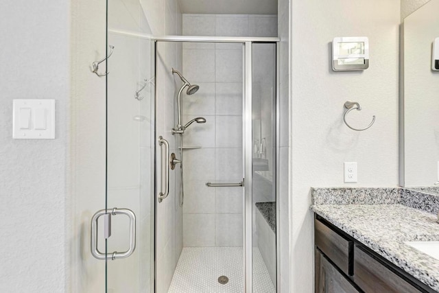 4228 Hannover Way, Round Rock, TX 78681 - bathroom featuring vanity and a stall shower