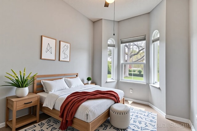 3100 Jubilee Trl, Austin, TX 78748 - bedroom with baseboards and ceiling fan