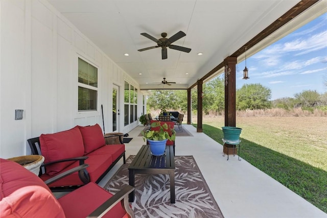 view of patio featuring a ceiling fan, french doors, and an outdoor hangout area