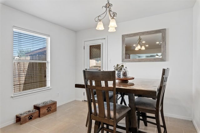 6801 Campina Xing, Del Valle, TX 78617 - dining room with a chandelier and light tile patterned floors