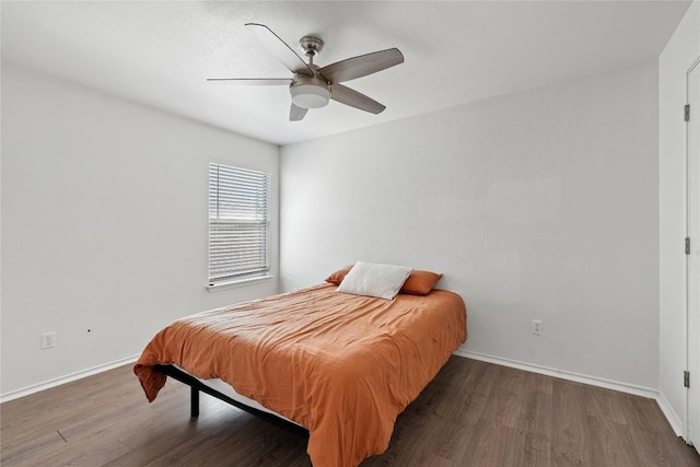 6801 Campina Xing, Del Valle, TX 78617 - bedroom featuring wood finished floors and a ceiling fan