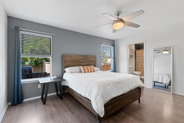 6801 Campina Xing, Del Valle, TX 78617 - bedroom with wood finished floors, a ceiling fan, and ensuite bath