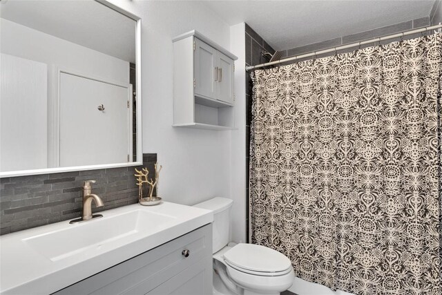 6801 Campina Xing, Del Valle, TX 78617 - bathroom with decorative backsplash, vanity, and a shower with shower curtain