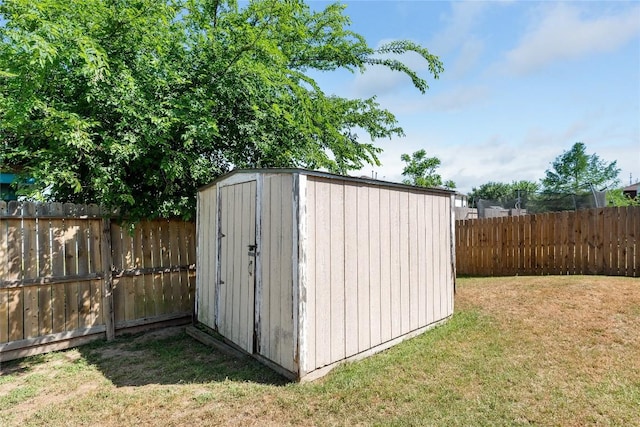 6801 Campina Xing, Del Valle, TX 78617 - view of shed featuring a fenced backyard