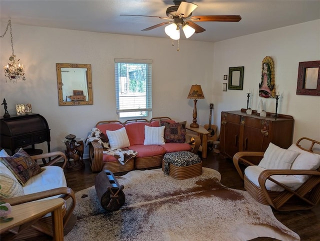 living room with ceiling fan and wood finished floors