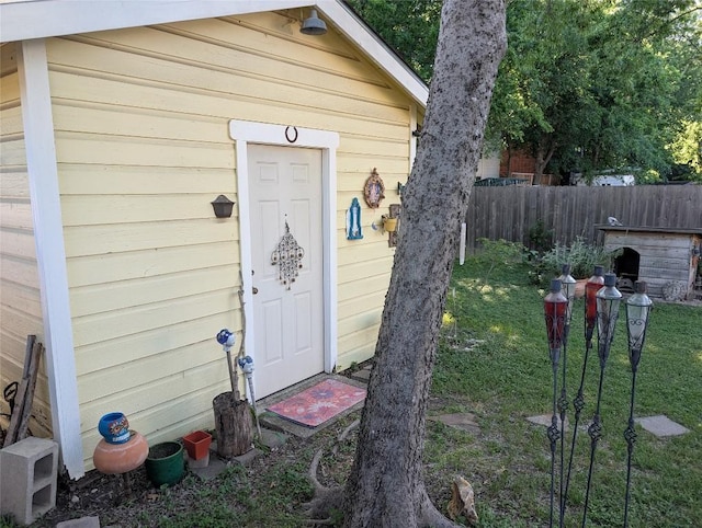 view of outdoor structure with fence