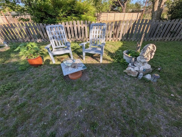 view of yard featuring a fenced backyard