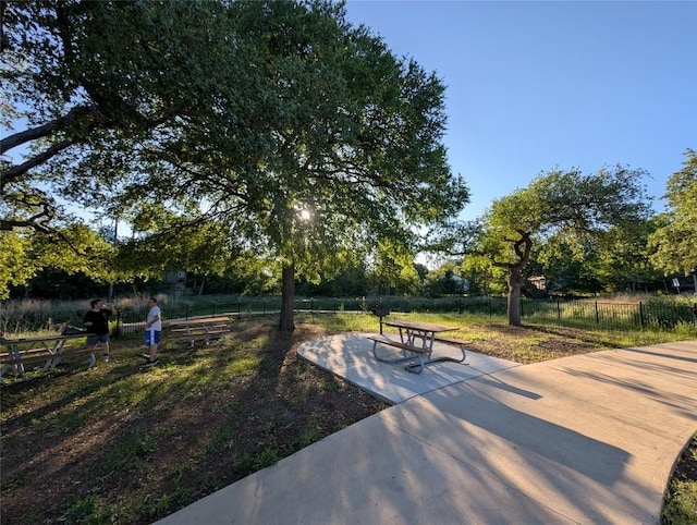 view of community with fence