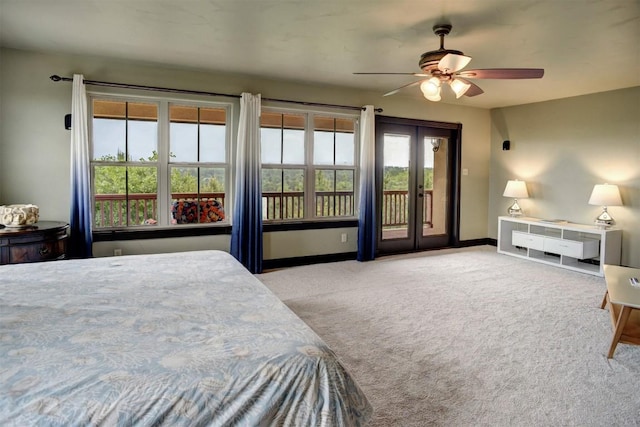 bedroom with baseboards, carpet flooring, ceiling fan, and access to exterior