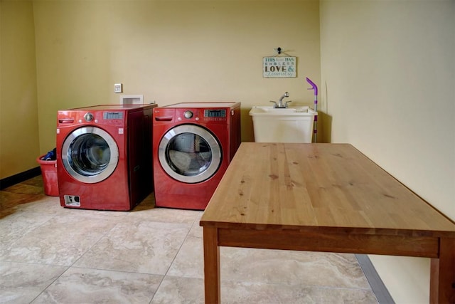 134 River Forest Dr, Bastrop, TX 78602 - laundry room with washer and clothes dryer and tile patterned floors