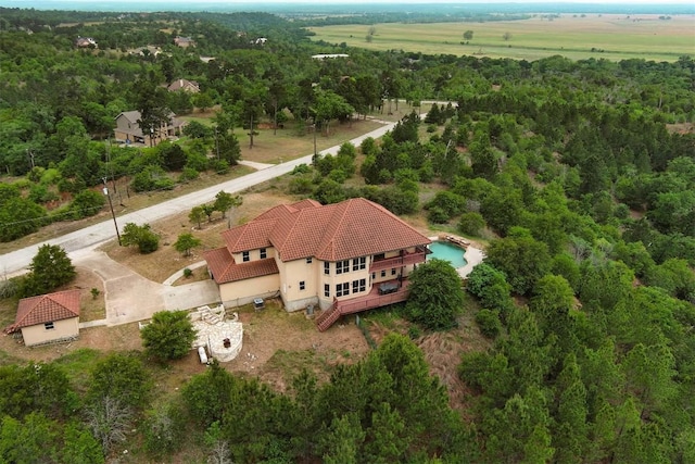 bird's eye view featuring a view of trees
