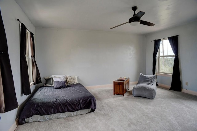 134 River Forest Dr, Bastrop, TX 78602 - carpeted bedroom with baseboards and a ceiling fan