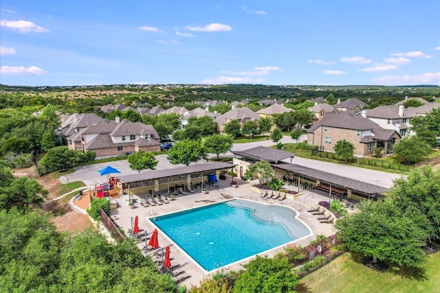 8813 Fescue Ln, Austin, TX 78738 - aerial perspective of suburban area with a pool area