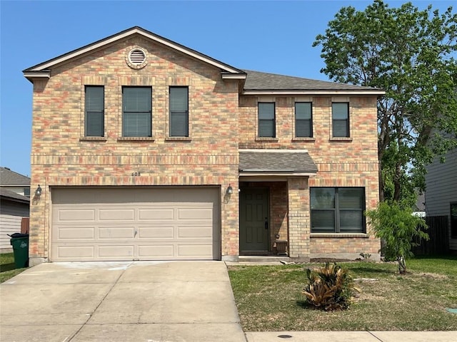 608 Glacier Point Trl, Taylor, TX 76574 - view of front of home featuring an attached garage, driveway, roof with shingles, a front lawn, and brick siding