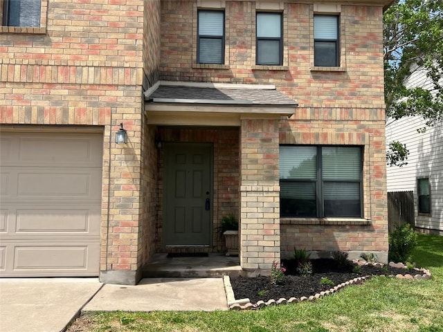 doorway to property featuring brick siding