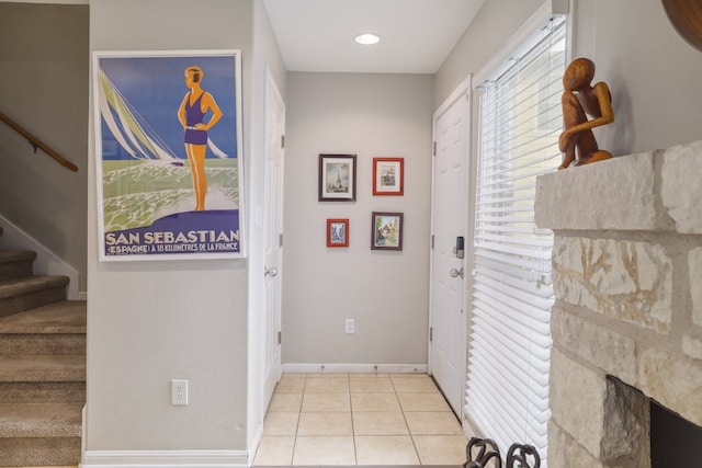 6900 E Riverside Dr Unit 24, Austin, TX 78741 - interior space featuring baseboards, stairs, and light tile patterned floors