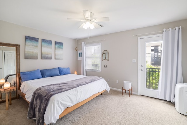 6900 E Riverside Dr Unit 24, Austin, TX 78741 - bedroom featuring carpet, access to exterior, and a ceiling fan