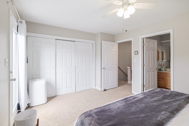 6900 E Riverside Dr Unit 24, Austin, TX 78741 - bedroom featuring carpet flooring, a closet, and ceiling fan