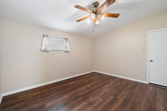 unfurnished room with wood finished floors, a ceiling fan, and baseboards