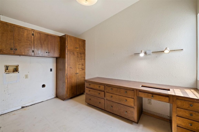 laundry room featuring electric dryer hookup, cabinet space, and hookup for a washing machine