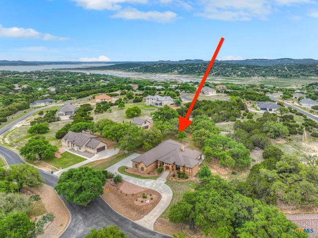 116 San Salvadore Dr, Canyon Lake, TX 78133 - aerial view of property and surrounding area featuring nearby suburban area and a nearby body of water