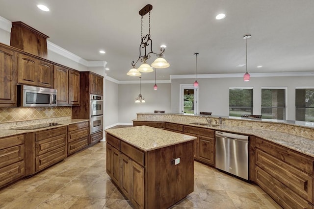 116 San Salvadore Dr, Canyon Lake, TX 78133 - kitchen featuring appliances with stainless steel finishes, a center island, recessed lighting, backsplash, and decorative light fixtures
