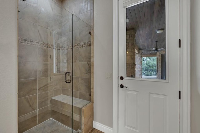 116 San Salvadore Dr, Canyon Lake, TX 78133 - bathroom featuring a stall shower and baseboards