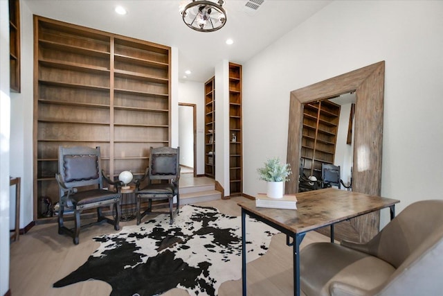 office area with a chandelier, visible vents, recessed lighting, and built in features