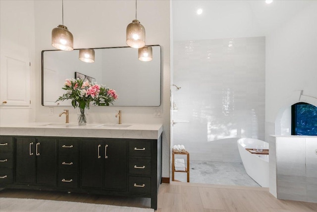 100 Mesa Dr, Wimberley, TX 78676 - bathroom with double vanity and a freestanding bath