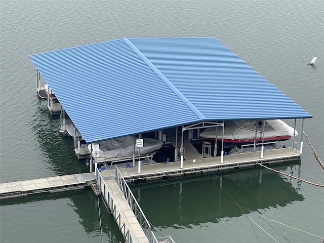 view of dock with a water view and boat lift