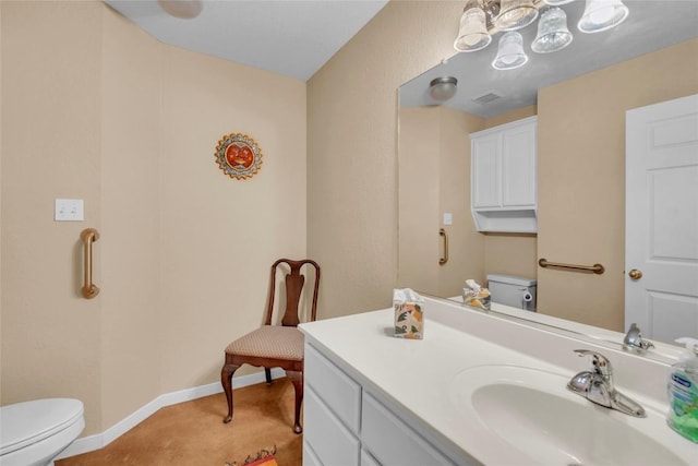 half bathroom with toilet, baseboards, and vanity