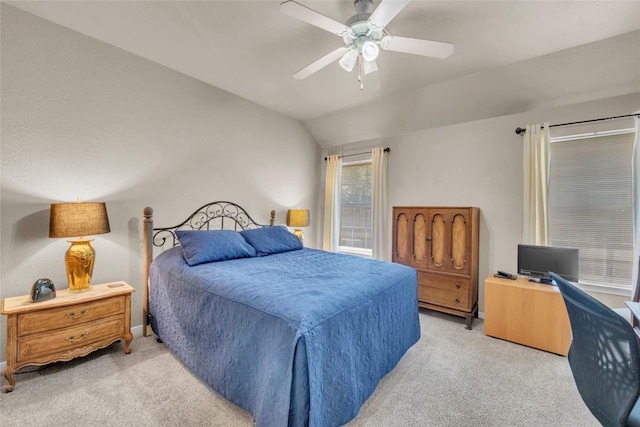 bedroom featuring light colored carpet, ceiling fan, and vaulted ceiling