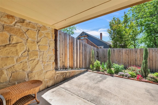 view of patio featuring a fenced backyard