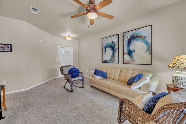 carpeted living room featuring baseboards, ceiling fan, and visible vents