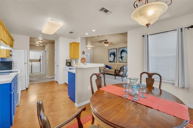 dining area featuring ceiling fan, visible vents, baseboards, and finished concrete flooring