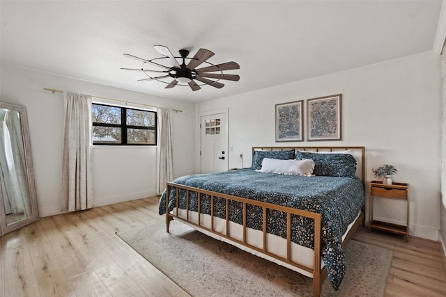 326 W Mulberry St, Fredericksburg, TX 78624 - bedroom featuring wood finished floors, baseboards, and ceiling fan
