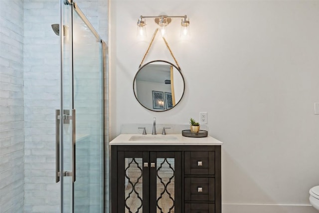 326 W Mulberry St, Fredericksburg, TX 78624 - full bathroom with toilet, baseboards, vanity, and a stall shower