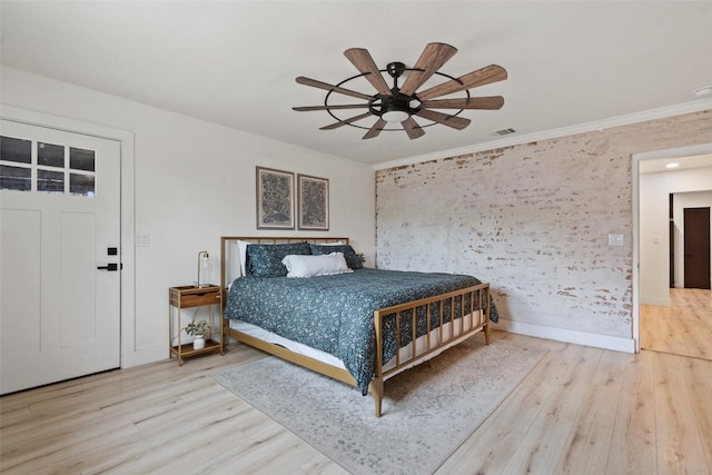 326 W Mulberry St, Fredericksburg, TX 78624 - bedroom with wood finished floors, visible vents, a ceiling fan, and baseboards