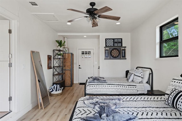 326 W Mulberry St, Fredericksburg, TX 78624 - bedroom with attic access, visible vents, recessed lighting, and light wood-style floors