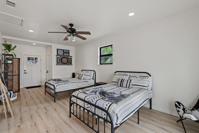 326 W Mulberry St, Fredericksburg, TX 78624 - bedroom with attic access, visible vents, recessed lighting, light wood-style floors, and a ceiling fan