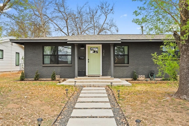 326 W Mulberry St, Fredericksburg, TX 78624 - view of front of house with brick siding