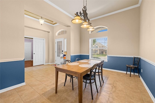 814 Arrowhead Trl, Cedar Park, TX 78613 - tiled dining area with ornamental molding, baseboards, and a towering ceiling