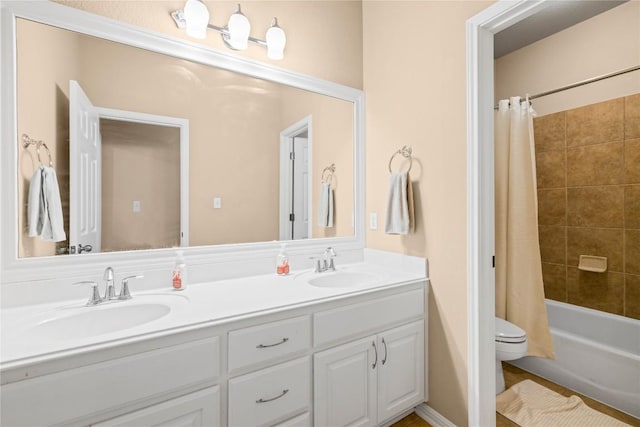 814 Arrowhead Trl, Cedar Park, TX 78613 - bathroom featuring toilet, double vanity, and shower / bath combination with curtain