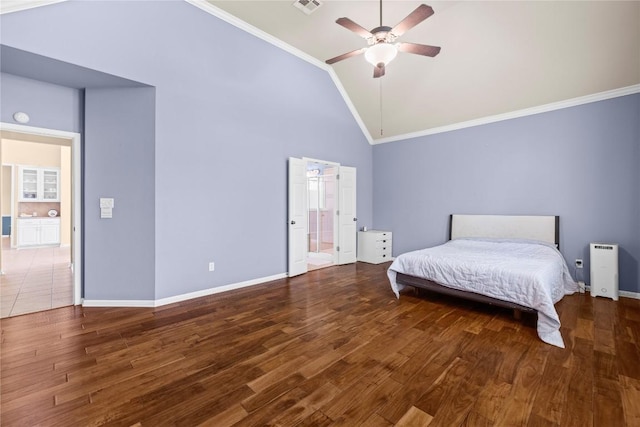 814 Arrowhead Trl, Cedar Park, TX 78613 - bedroom featuring crown molding, wood finished floors, baseboards, high vaulted ceiling, and a ceiling fan