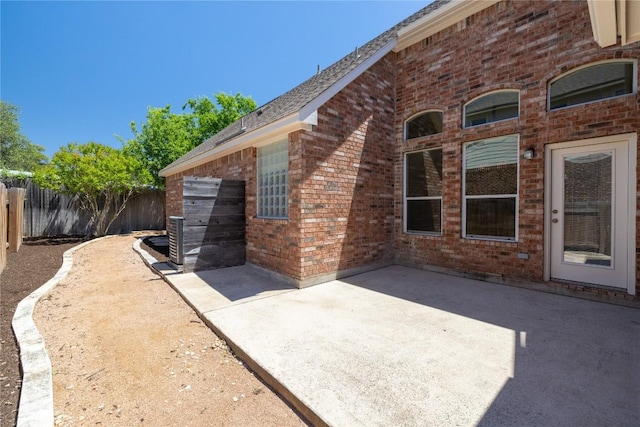 814 Arrowhead Trl, Cedar Park, TX 78613 - fenced backyard with a patio