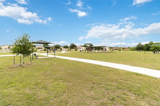 view of home's community with a gazebo and a lawn