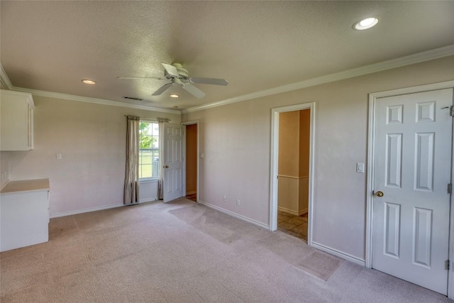 interior space with light carpet, baseboards, and visible vents