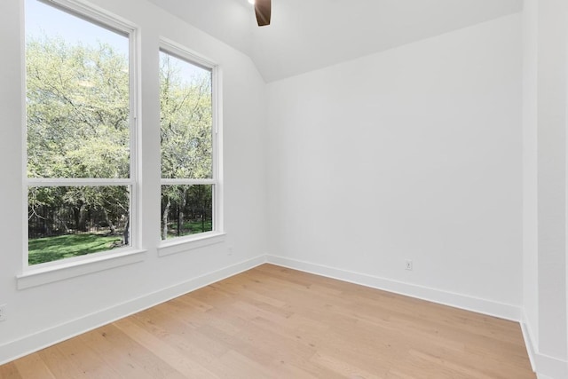 394 Leaning Rock Rdg, Austin, TX 78737 - empty room featuring ceiling fan, lofted ceiling, light wood-type flooring, and baseboards
