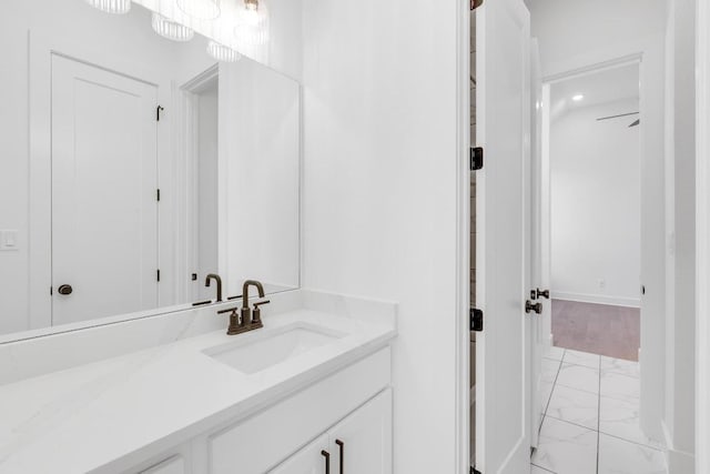 394 Leaning Rock Rdg, Austin, TX 78737 - bathroom featuring marble finish floors and vanity