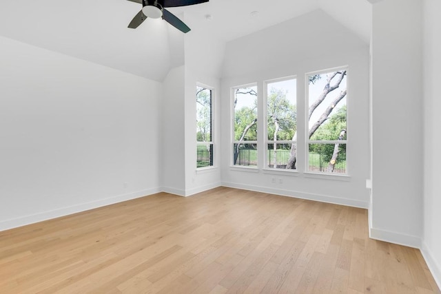 394 Leaning Rock Rdg, Austin, TX 78737 - spare room featuring a ceiling fan, light wood finished floors, baseboards, and lofted ceiling